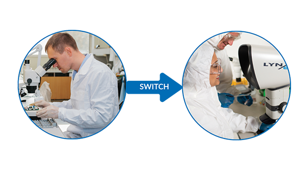Man in white coat look through binocular microscope, women in clean room looking through eyepiece-less microscope
